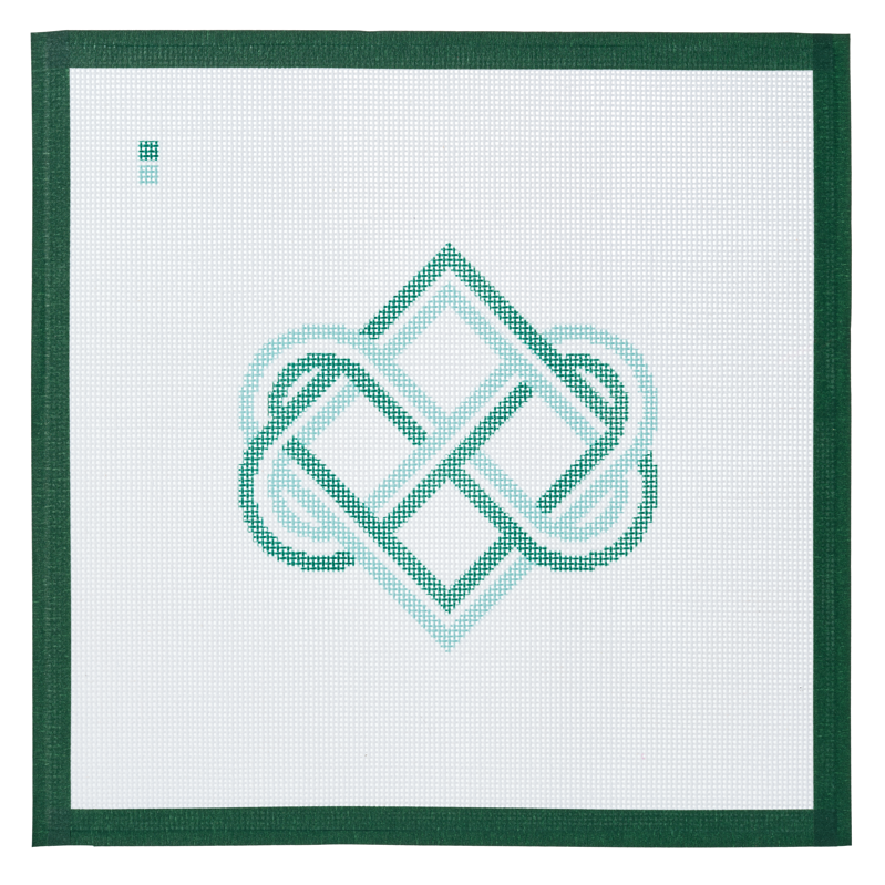 A needlepoint canvas printed with a green Celtic infinity diamond knot on white mesh.