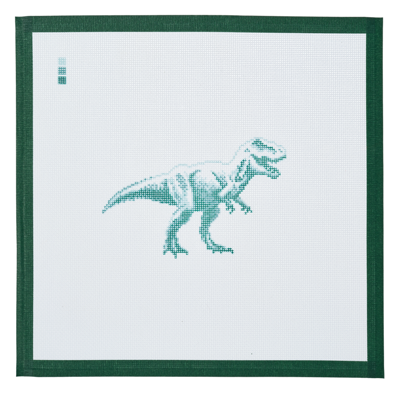 A needlepoint canvas printed with a green tyrannosaurus rex, on white mesh with a dark green taped edge.