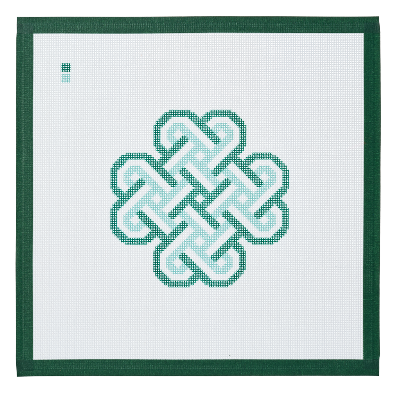 A needlepoint canvas printed with a green Celtic endless love knot on white mesh.