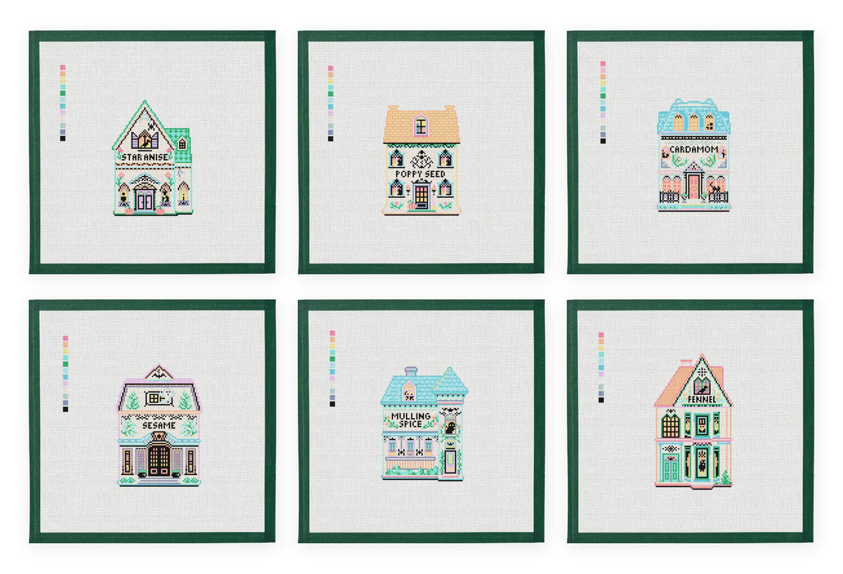 The six Halloween Spice Village needlepoint canvases, each with its green taped margin, arranged in two rows on white.