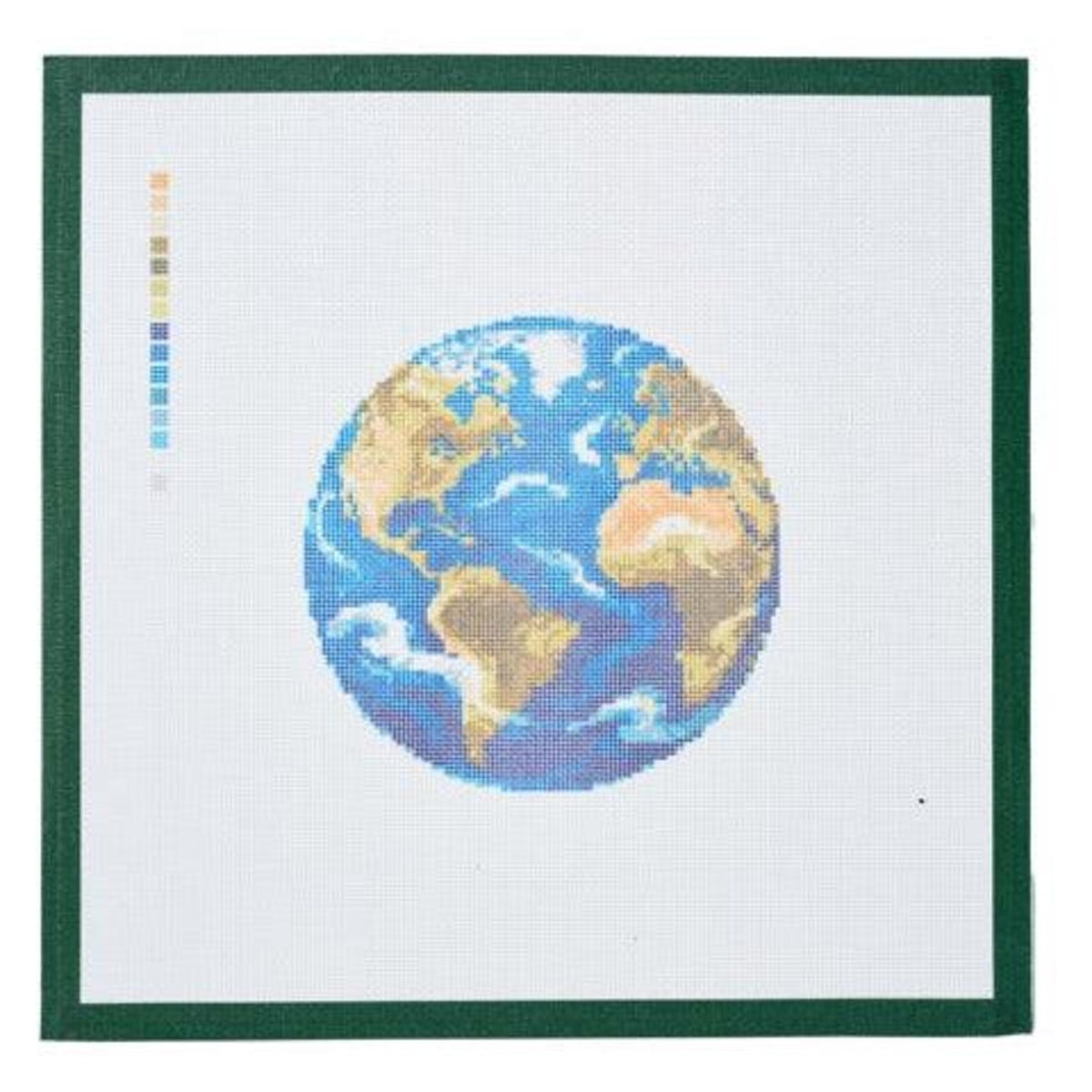 A needlepoint canvas printed with the Earth seen from space, blue oceans and white clouds, on white mesh with a dark green taped edge and a color key at left.