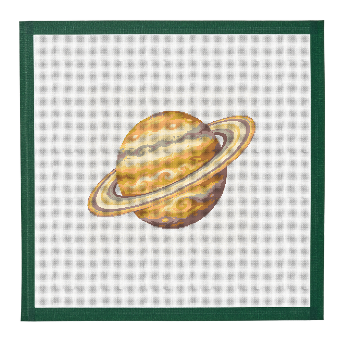 Needlepoint canvas of the planet Saturn in pale gold with its rings, on white mesh with a dark green taped edge.